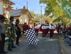 Camat Giligenting Meriahkan HUT RI ke-79 dengan Melepas Gerak Jalan Pelajar se-Giligenting