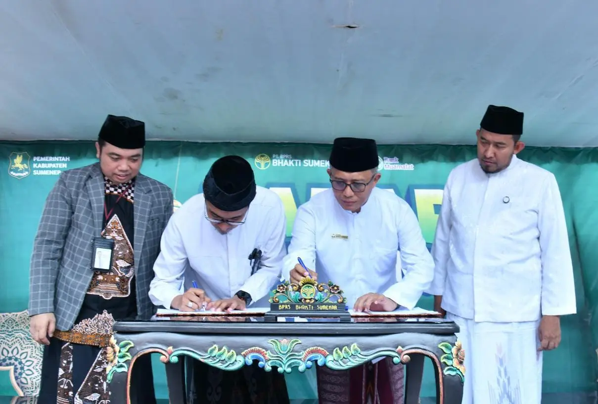 Penandatanganan MoU antara BPRS Bhakti Sumekar dan Bank Muamalat Indonesia untuk pengembangan layanan digital perbankan syariah di Sumenep