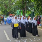 MI Nurul Hidayah Bluto Turunkan Regu Putra dan Putri di Lomba Gerak Jalan HAB Kemenag RI ke-80