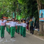 MI Nurul Hidayah Ikut Gerak Jalan HAB Kemenag ke-80 di Sumenep