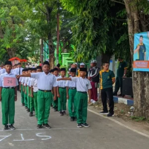 MI Nurul Hidayah Ikut Gerak Jalan HAB Kemenag ke-80 di Sumenep