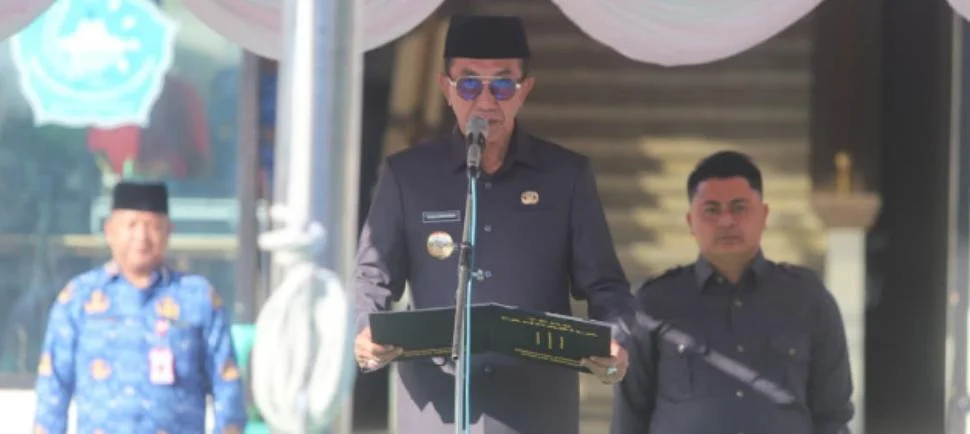 Bupati Pamekasan Kholilurrahman saat memimpin upacara Harkitnas 2026 dan mengajak masyarakat memperkuat perlindungan anak di ruang digital