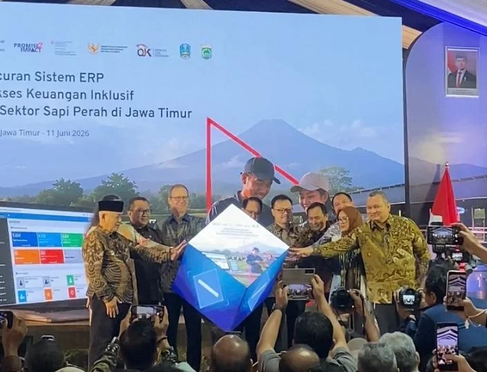 Bupati Malang Sanusi saat menghadiri peluncuran ERP dan program inklusi keuangan bagi peternak sapi perah di KAN Jabung.