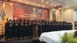 Prosesi pengesahan 107 warga baru PSHT Cabang Sumenep tingkat I Tahun 2026 di Gedung KORPRI Sumenep