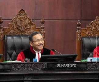Ketua MK Suhartoyo membacakan putusan mengenai mekanisme pemilihan kepala daerah secara langsung
