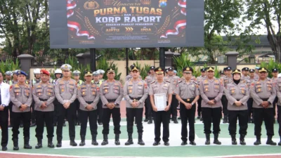 Kapolresta Sumenep memimpin upacara purna tugas dan kenaikan pangkat pengabdian Polri.
