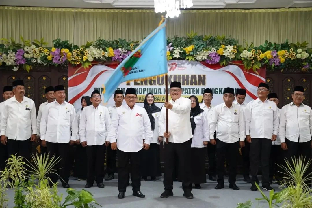 Pengukuhan pengurus Dekopinda Kabupaten Bangkalan periode 2025–2030 pada peringatan Harkopnas ke-79.