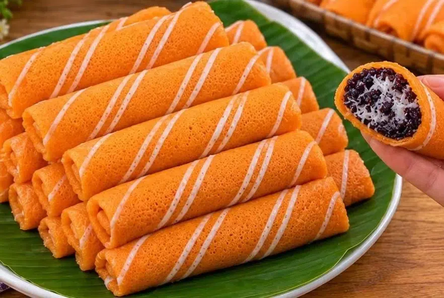 Resep dadar gulung oranye isi ketan hitam dengan kulit lembut dan isian ketan hitam yang kenyal